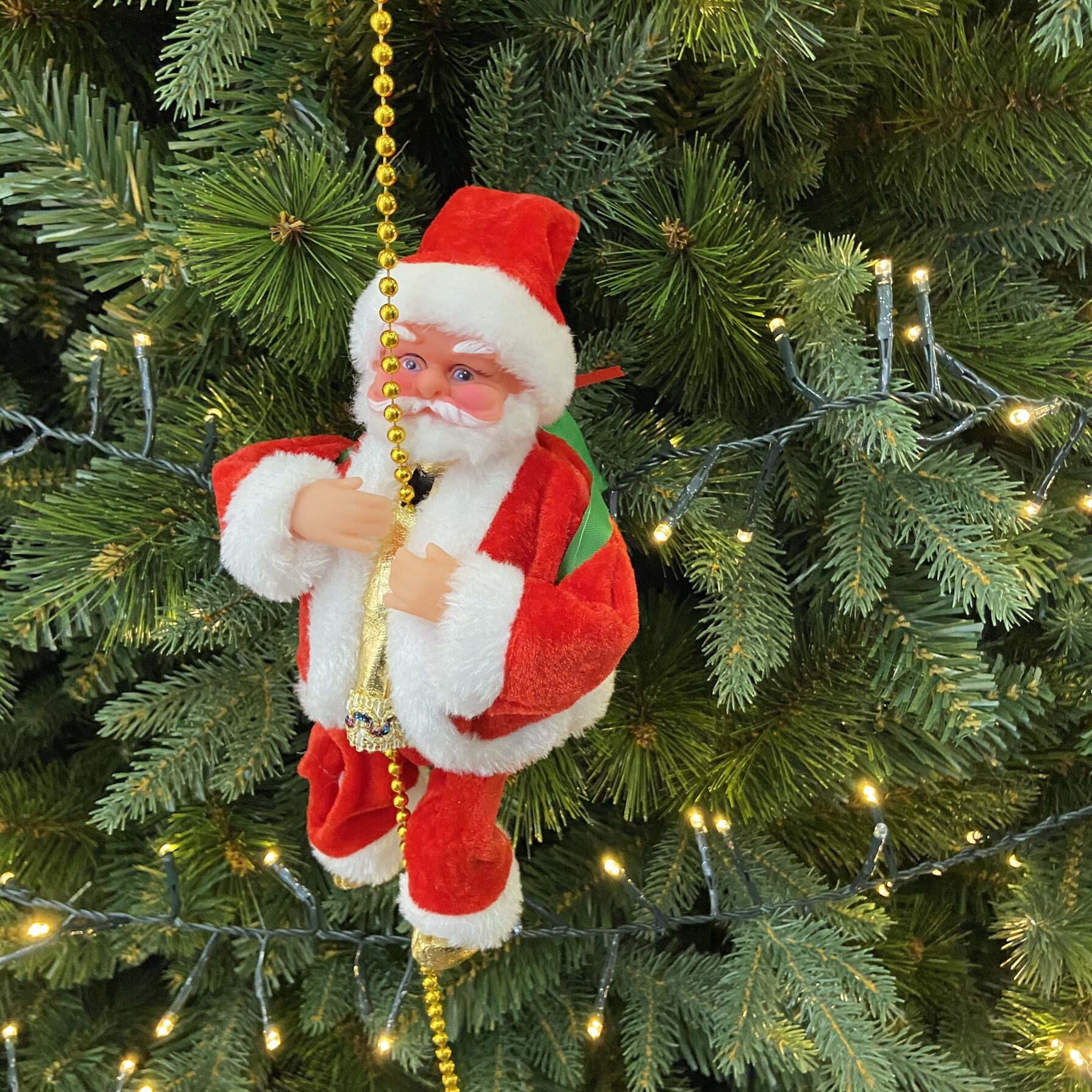 Santa Claus climbing ladder electric decoration on red ladder – LumiqHome