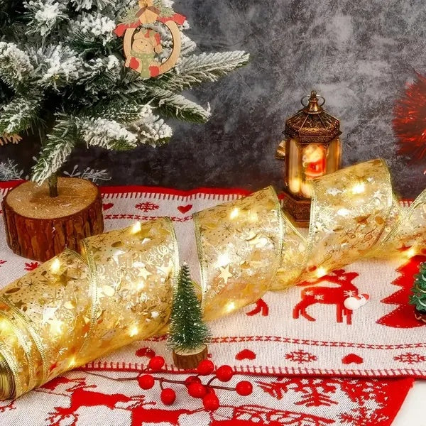 A Christmas Tree With 32 Feet Of Ribbon by LumiqHome – elegant led christmas décor in a cozy setting